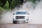 2020 GMC Acadia AT4 AWD in Summit White - Driving Frontal View